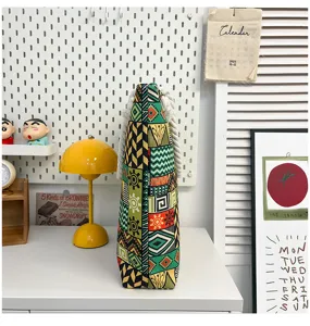 Geprinte canvas tote bag met etnisch geometrisch patroon en stevige touw handgrepen.