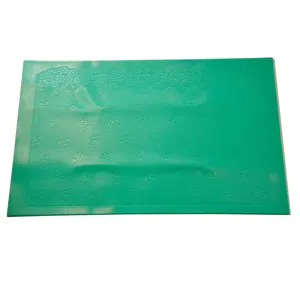 Green silicone lace embossing mat detail, floral pattern for baking and cake decorating.