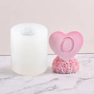 Detailed view of the silicone candle mold with heart rose design and finished product.