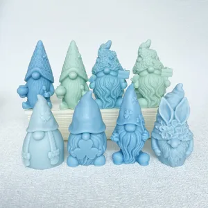 Cute gnome silicone molds with clover and flower hats, perfect for DIY craft and decor.