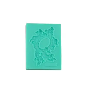 Silicone fondant mold detail showing European relief pattern and letter design for cake decorating.