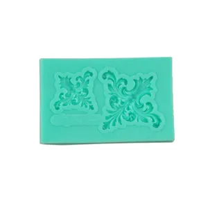 Detailed view of baroque scroll relief silicone fondant mold for cake decorating and baking.