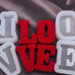 LOVE silicone letter candle molds and red rose shaped wax pieces for handmade crafts decor.