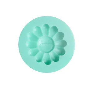 Silicone cake mold with cute smiling flower design for baking fondant and chocolate.
