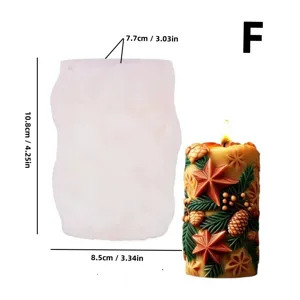 Christmas candle silicone mold detailed display with festive pine cone and star relief.