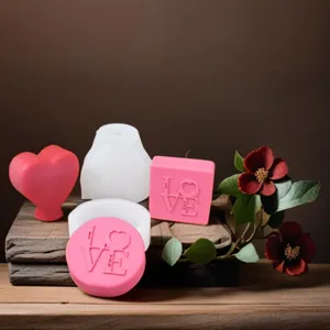 Detailed close-up view of Valentine DIY silicone candle soap molds with love relief.