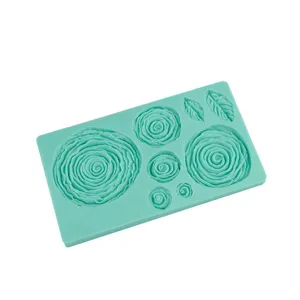 Silicone mold detail showing rose and leaf patterns for fondant cake decoration and baking crafts.