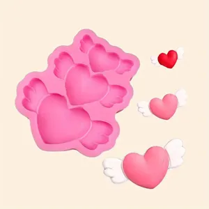 Detailed view of the heart wings silicone mold, perfect for DIY baking and cake decoration.