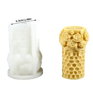 Silicone candle mold with honeycomb rose finished candle for DIY craft and aromatherapy decor.