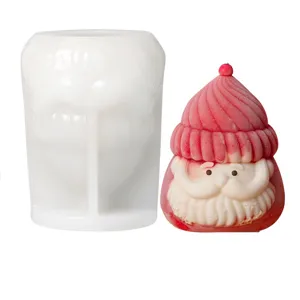 Detailed view of the Christmas Santa silicone mold and finished scented candle craft.