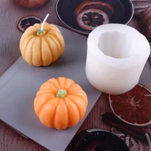 Silicone pumpkin mold set with finished candles for DIY Halloween baking and aromatherapy crafts.