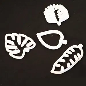 White plastic leaf fondant cookie cutters set for DIY cake baking and decorating tools