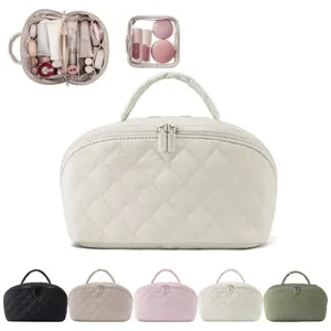 Large capacity quilted cosmetic bag with handle, multi-compartment travel makeup organizer.