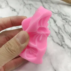DIY pink silicone fondant mold for chocolate, cake decoration, and ultra-light clay crafts.