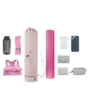 Zaino rosa multifunzionale per tappetino yoga e set di accessori fitness vista dettagliata.