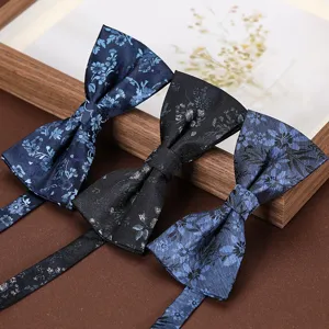 Close-up view of elegant jacquard bowties featuring floral patterns and stripe details for men.