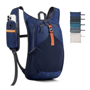 Detail of outdoor lightweight foldable hiking backpack with phone pouch and breathable shoulder straps.
