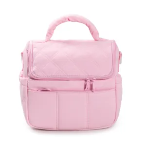Detailed view of the pink quilted lunch bag with insulated design and durable handle.
