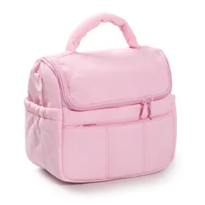 Pink quilted lunch bag with top handle and front zipper pocket for daily meal prep.