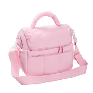 Pink quilted insulated lunch bag detail, soft cooler bag with top handle and strap.