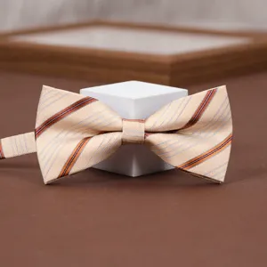 Detailed view of a light beige bow tie featuring elegant diagonal orange and blue stripes.