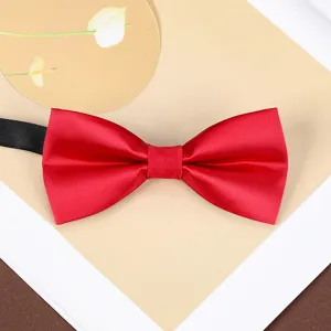 Burgundy bow tie detail showing premium satin texture and neat bow shape for formal suit wear.