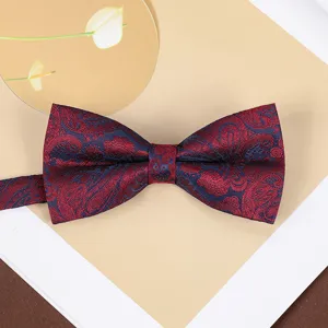 Classic burgundy and navy blue paisley bow tie for men, perfect for weddings and formal wear.