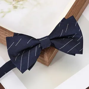 Mens dark blue bow tie with stylish dashed pattern, perfect for formal business and wedding suits.