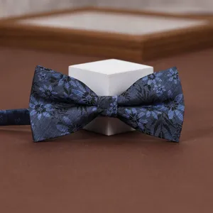 Detailed view of the blue floral jacquard bow tie, elegant men's accessory for formal wear.