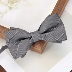 Grey men's bow tie formal business wedding groom wear accessory fine textured fabric.