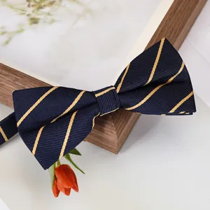 Detail shot of elegant blue striped bow tie with yellow lines for formal business attire.