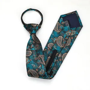 Detalle de corbata con cremallera Paisley, patrón negro y turquesa, accesorio formal de negocios.