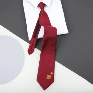 Red zipper necktie detail with double happiness embroidery, ideal for wedding and formal wear.
