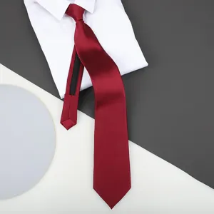 Red zipper tie detail shot showcasing smooth fabric and convenient pre-tied design features.