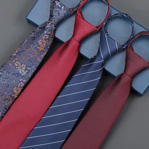 Detailed view of business zipper neckties showcasing paisley and striped pattern designs.