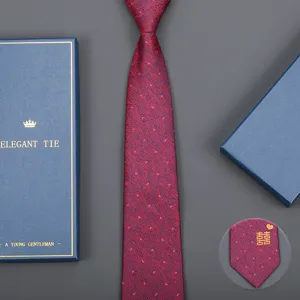 Burgundy wedding men tie gift box elegant detail view with double happiness motif.