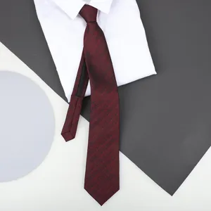 Red zippered necktie detail view, premium fabric texture for business formal and wedding groom wear.