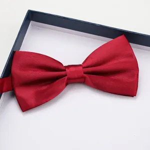 Wine red satin bow tie detail shot, exquisite texture and neat gift box packaging.