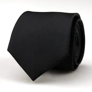 Classic black business necktie featuring subtle diagonal twill weave texture for formal wear.