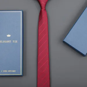 Detailed view of a classic red striped business formal tie presented with an elegant blue gift box.