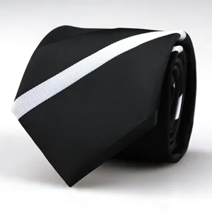 Close-up detail of a classic black necktie featuring a bold white diagonal stripe pattern.