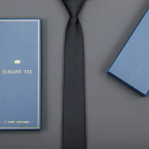 Classic black business necktie paired with an elegant blue gift box, perfect for formal events.