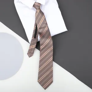 Detailed view of business striped zipper necktie in brown paired with crisp white shirt.