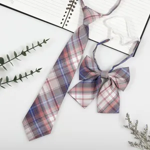 Detailed view of Japanese style plaid JK DK necktie and bow tie set, exquisite fabric texture.