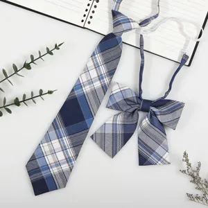 Detailed view of Japanese school style blue plaid pre-tied tie and bow set for uniform shirts.