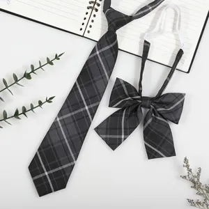 Detail view of grey plaid JK tie and bow set, perfect for school uniform styling.