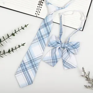Japanese JK DK style blue plaid necktie and bow tie set, detail view of shirt accessories.