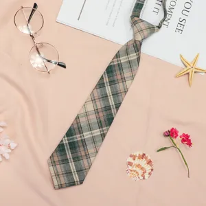 Close-up detail of the Japanese style plaid necktie, showing fabric texture and pattern.