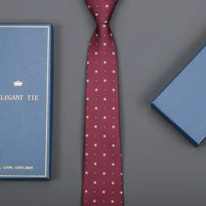 Burgundy business tie with white dots and gift box detail view, premium men's formal wear.