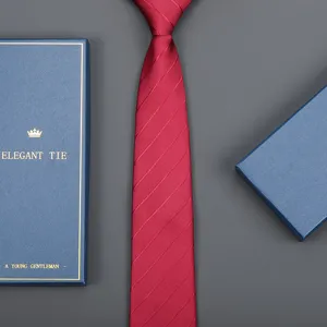 Red striped business necktie with gift box, classic formal wear accessory for men.